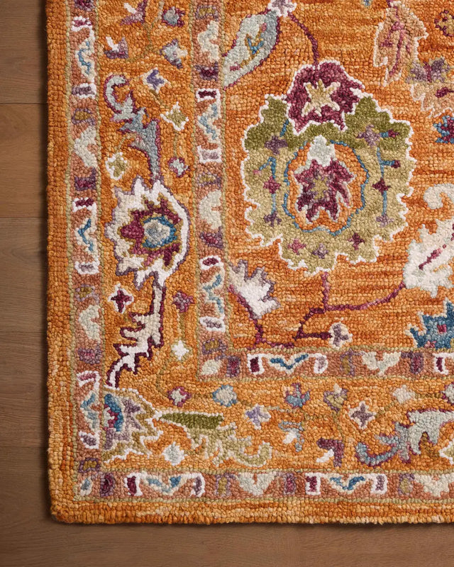 Loloi Padma Pma-01 Orange/Multi Rugs - corner on wood