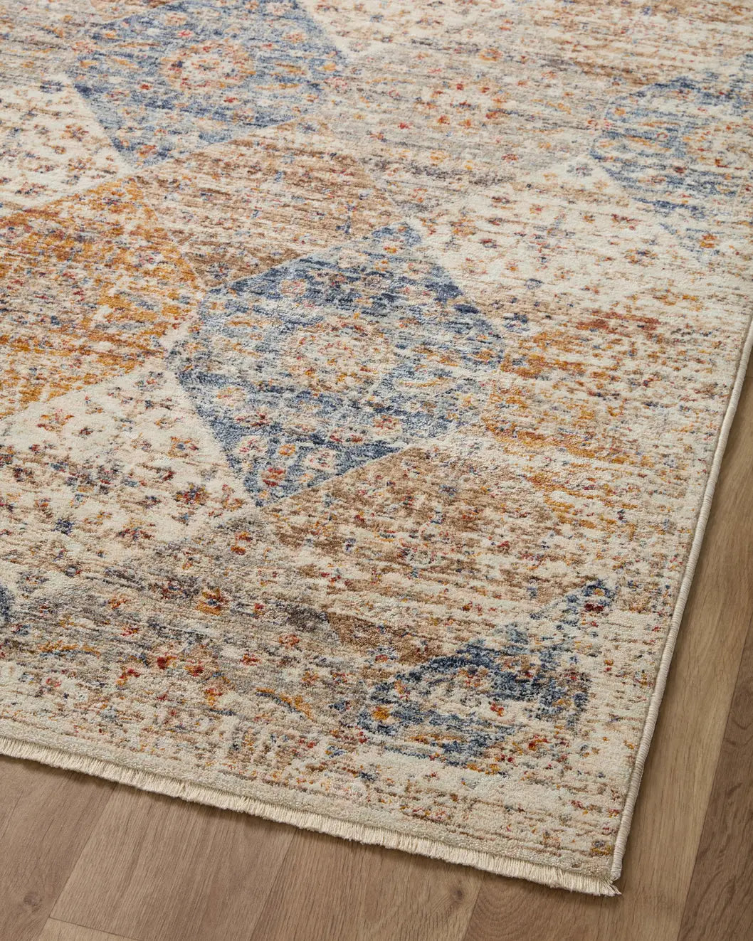 Loloi Sorrento Sor-02 Ivory/Multi Rug - angled corner on wood