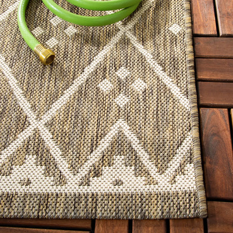 Safavieh Courtyard 4'-0" x 5'-7" Rug in Brown / Light Beige