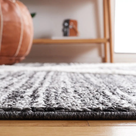 Safavieh Moroccan Tassel Shag 4'-0" x 6'-0" Rug in Black / Ivory