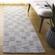Safavieh Montauk 2'-3" x 8'-0" Rug in Black / Ivory