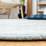 Safavieh Braided 5'-0" x 7'-0" Rug in Grey / Ivory
