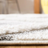 Safavieh Moroccan Tassel Shag 4'-0" x 6'-0" Rug in Ivory / Grey
