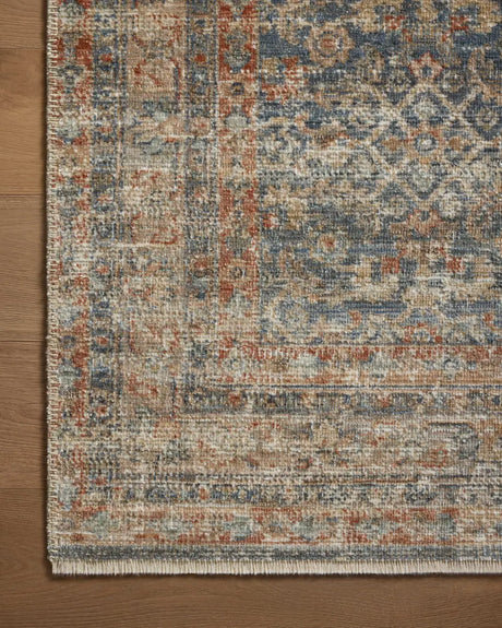 Loloi Heritage Her-12 Blue/Rust Rug - corner on wood