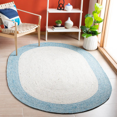 Safavieh Braided 5'-0" x 7'-0" Rug in Ivory / Blue