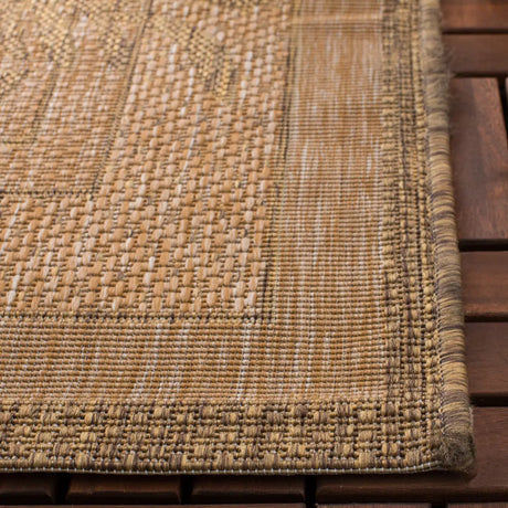 Safavieh Courtyard 5'-3" x 7'-7" Rug in Natural / Gold
