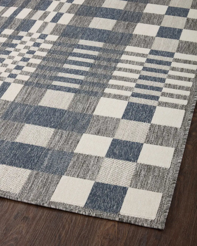 Loloi Rainier Rai-04 Ivory/Denim Rug - angled corner on wood