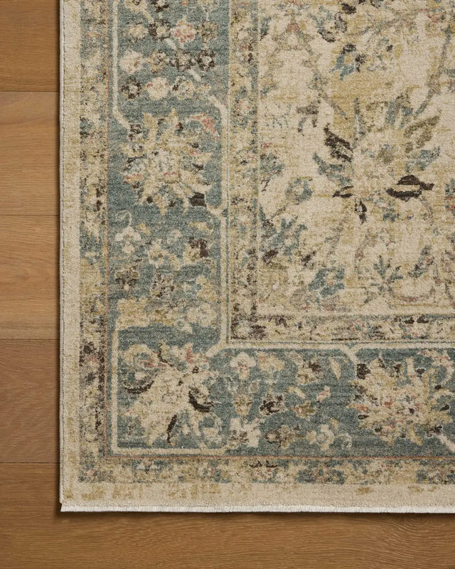 Loloi Briar BRR-05 Ant. Ivory / Blue Rug - corner on wood