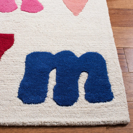 Safavieh Safavieh Kids 4'-0" x 6'-0" Rug in Ivory / Multi