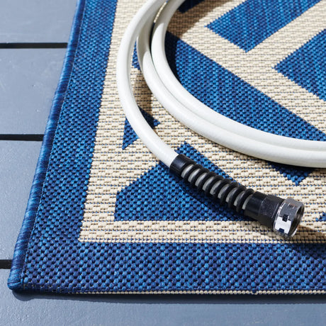 Safavieh Courtyard 5'-3" x 7'-7" Rug in Navy / Light Beige