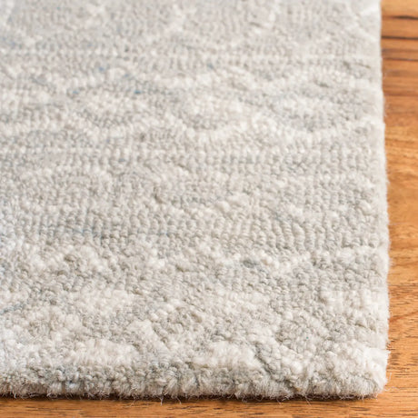 Safavieh Micro-Loop 4'-0" x 6'-0" Rug in Aqua / Ivory