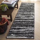 Safavieh Rumi Shag 2'-2" x 8'-0" Rug in Black / Ivory
