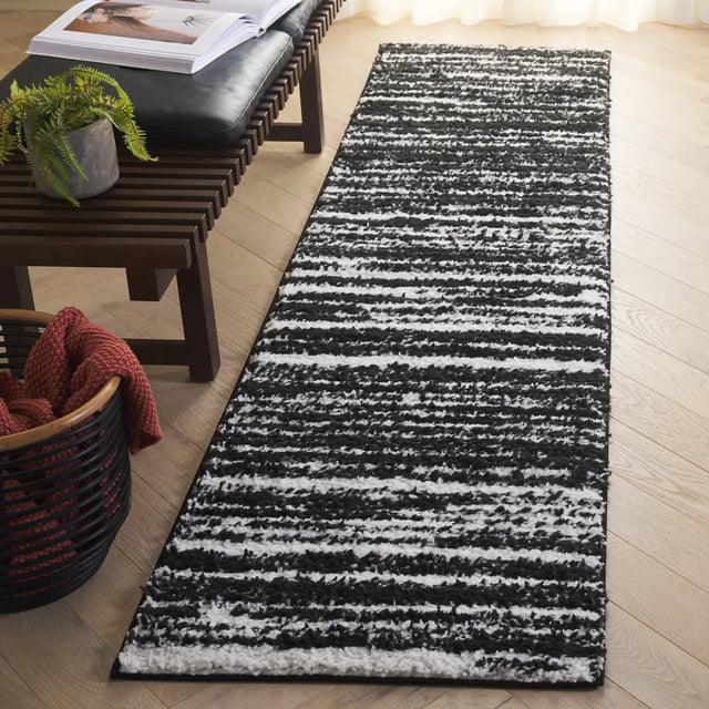 Safavieh Rumi Shag 2'-2" x 8'-0" Rug in Black / Ivory