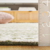 Safavieh Micro-Loop 4'-0" x 6'-0" Rug in Green / Ivory