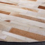 Safavieh Studio Leather 6'-0" x 6'-0" Rug in Tan / Ivory