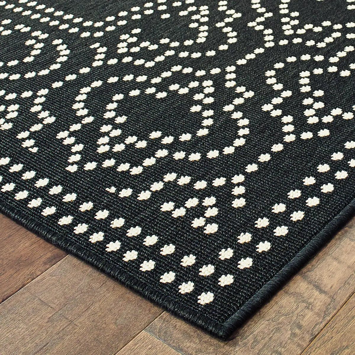 Oriental Weavers Sphinx Marina 1247K Black / Ivory Rugs - corner detail