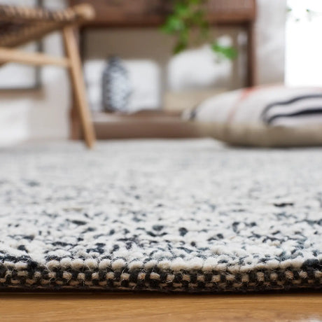 Safavieh Textual 4'-0" x 6'-0" Rug in Black / Ivory
