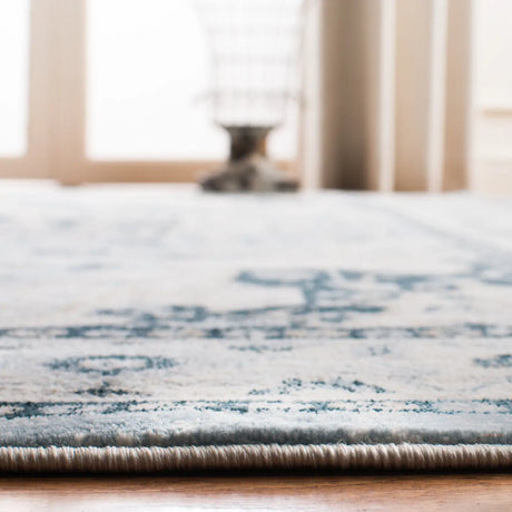 Safavieh Isabella 4'-0" x 6'-0" Rug in Light Blue / Cream