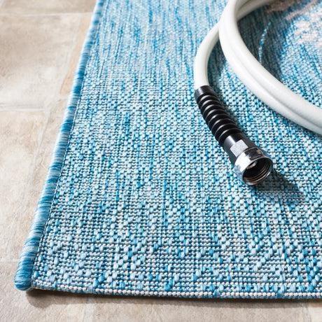 Safavieh Courtyard 4'-0" x 5'-7" Rug in Beige / Aqua