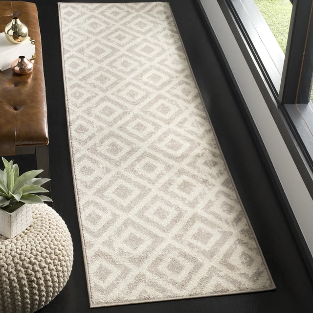 Safavieh Amsterdam 2'-3" x 8'-0" Rug in Ivory / Mauve