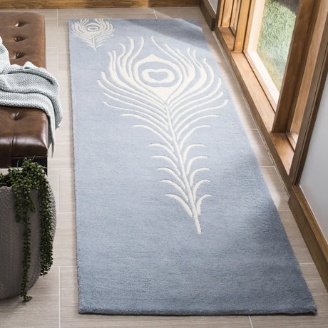 Safavieh Soho 2'-6" x 10'-0" Rug in Light Blue / Ivory