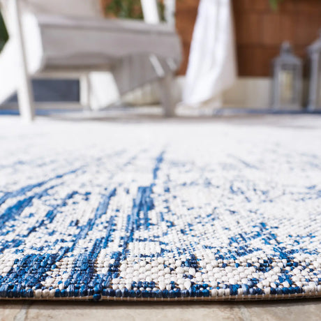 Safavieh Courtyard 4'-0" x 5'-7" Rug in Beige / Navy