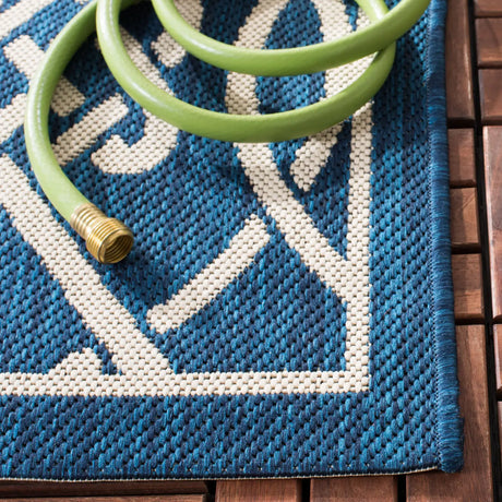 Safavieh Courtyard 5'-3" x 7'-7" Rug in Navy / Light Beige