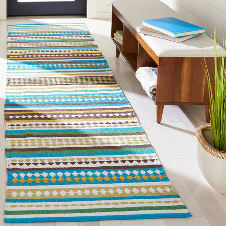 Safavieh Montauk 2'-3" x 9'-0" Rug in Light Blue / Ivory