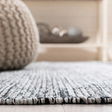 Safavieh Montauk 4'-0" x 6'-0" Rug in Light Green / Black