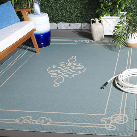 Safavieh Courtyard 4'-0" x 5'-7" Rug in Aqua / Cream