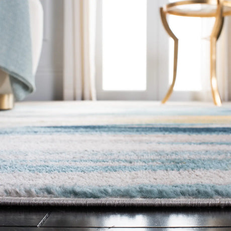 Safavieh Skyler 4'-5" x 6'-5" Rug in Beige / Navy