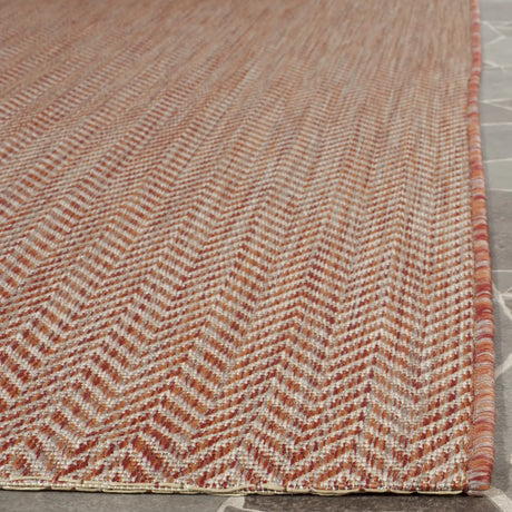 Safavieh Courtyard 6'-7" x 9'-6" Rug in Red / Beige