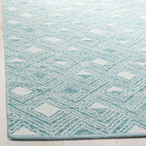 Safavieh Montauk 5'-0" x 8'-0" Rug in Aqua / Ivory