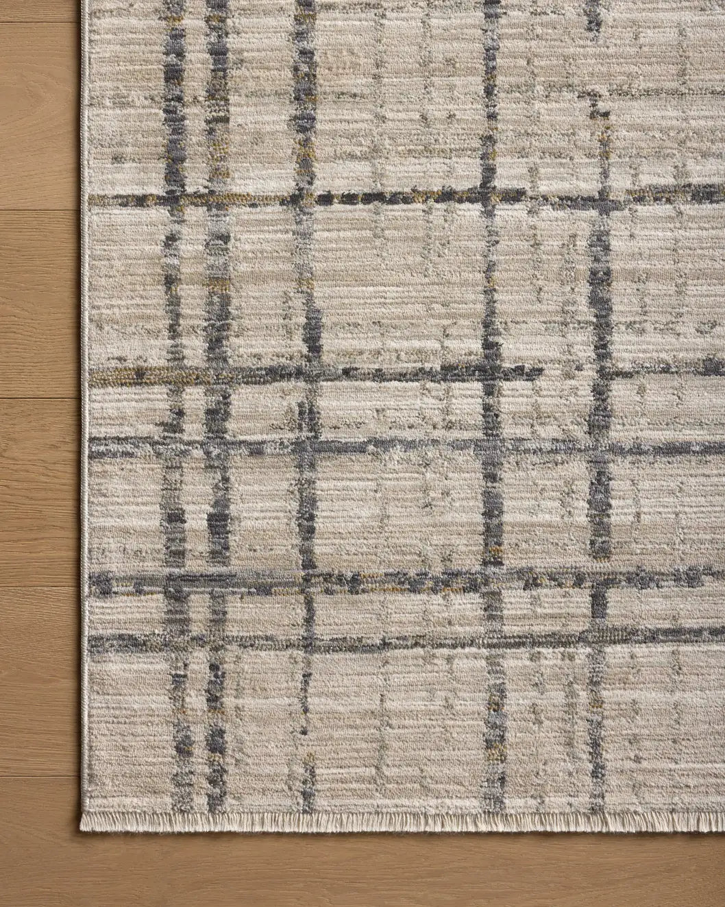 Loloi Wade Wae-05 Beige/Midnight Rug - corner on wood