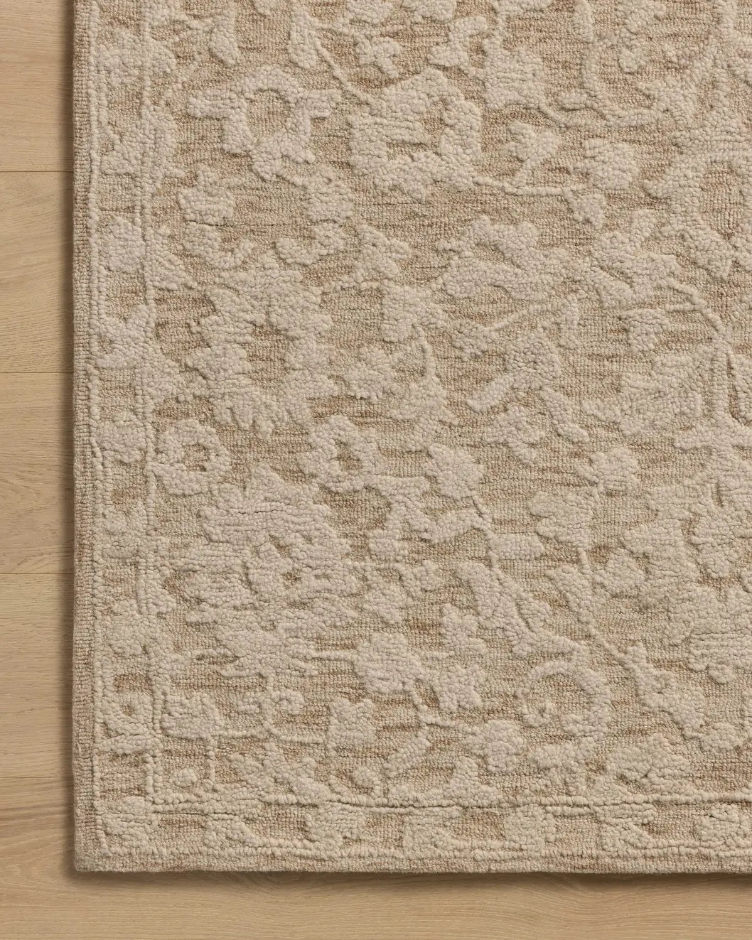 Loloi Prudence PRU-01 Clay / Ivory Hand Tufted Rug - corner on wood