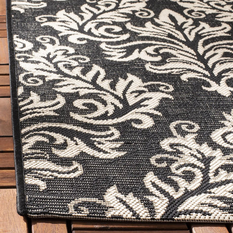 Safavieh Courtyard 4'-0" x 5'-7" Rug in Black / Creme