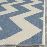 Safavieh Courtyard 6'-7" x 9'-6" Rug in Blue / Beige