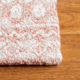 Safavieh Micro-Loop 5'-0" x 8'-0" Rug in Pink / Ivory