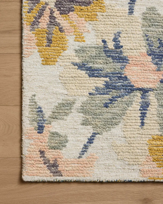 Loloi Tilly TIL-03 Bone / Multi Rug - corner on wood