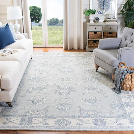 Safavieh Micro-Loop 10'-0" x 14'-0" Rug in Light Blue / Ivory
