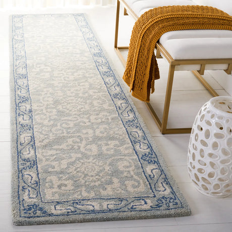 Safavieh Antiquity 2'-3" x 9'-0" Rug in Light Blue / Ivory