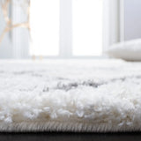 Safavieh Berber Shag 4'-5" x 6'-5" Rug in Cream / Light Grey