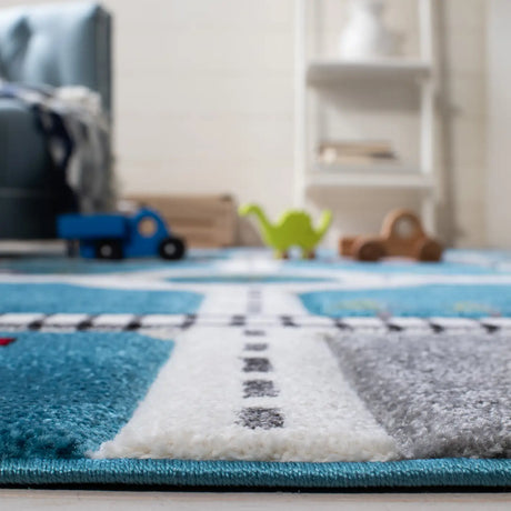 Safavieh Carousel Kids 100 4'-0" x 6'-0" Rug in Turquoise / Ivory