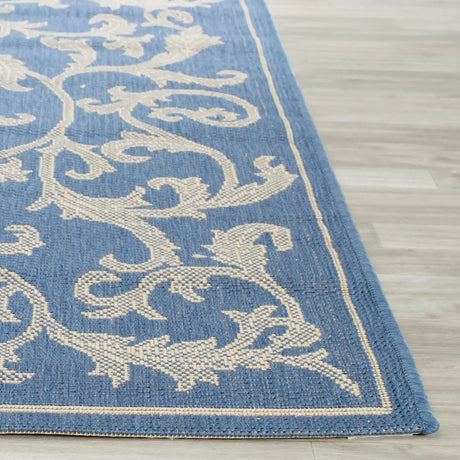 Safavieh Courtyard 6'-7" x 9'-6" Rug in Blue / Natural