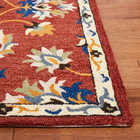 Safavieh Micro-Loop 4'-0" x 6'-0" Rug in Rust / Blue