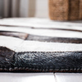 Safavieh Studio Leather 4'-0" x 6'-0" Rug in Black / Ivory