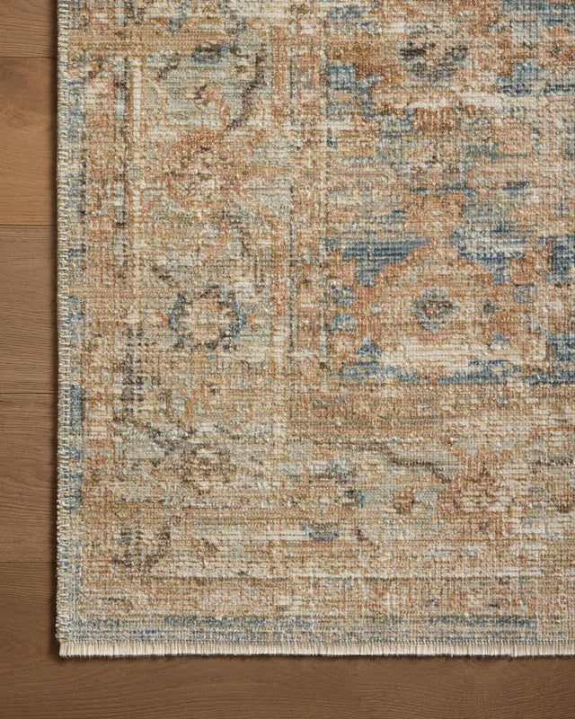 Loloi Heritage Her-15 Ocean/Sand Rug - corner on wood