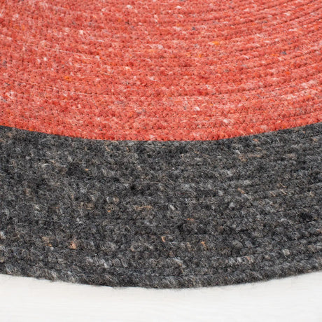 Safavieh Braided 5'-0" x 7'-0" Rug in Red / Black