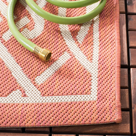 Safavieh Courtyard 5'-3" x 7'-7" Rug in Terracotta / Light Beige