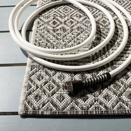 Safavieh Courtyard 4'-0" x 5'-7" Rug in Grey / Black